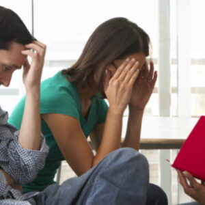 Two stressed individuals seeking help from a friend in a study setting