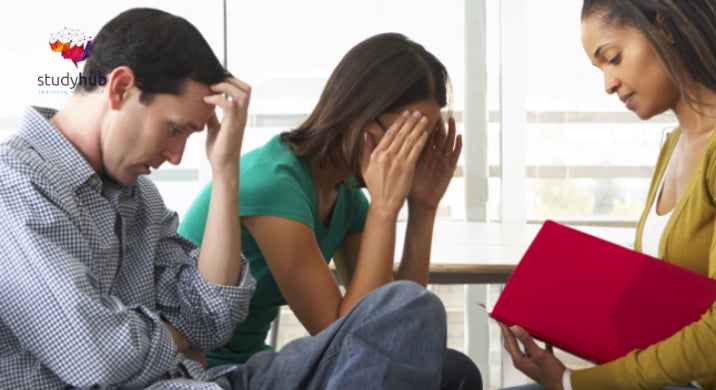 Two stressed individuals seeking help from a friend in a study setting