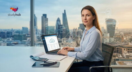 Professional bookkeeper analyzing financial spreadsheets on a laptop and using a calculator.