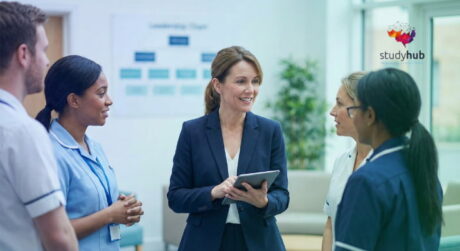 Senior healthcare manager reviewing operational strategies on a tablet in a modern UK hospital setting.