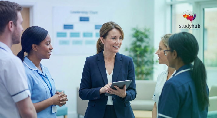 Senior healthcare manager reviewing operational strategies on a tablet in a modern UK hospital setting.