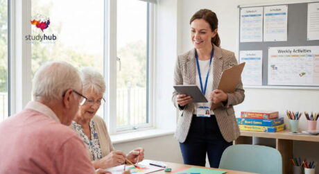 Female Activities Coordinator organizing arts and crafts for elderly residents in a care home.