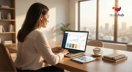 Digital entrepreneur reviewing sales analytics on a modern laptop workspace, illustrating the Selling E-books: The Best Way of Earning Online course